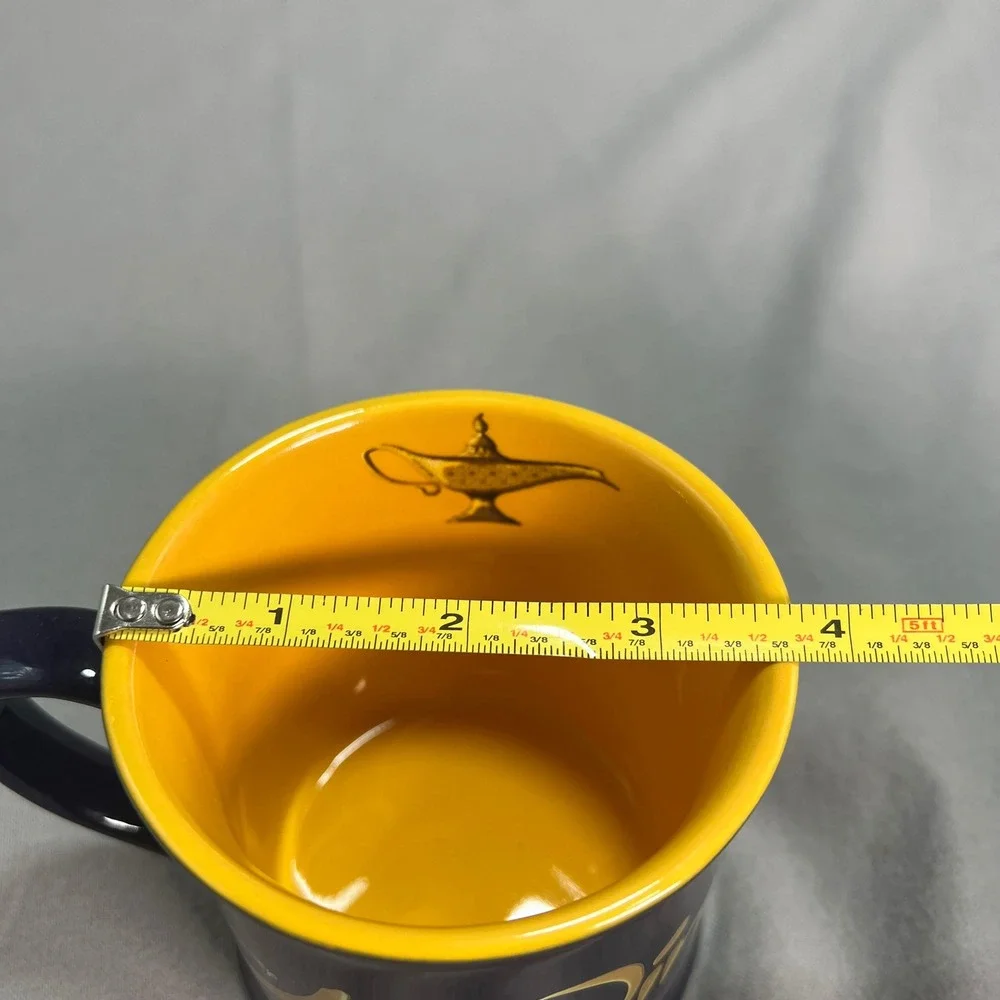 Disney Aladdin Broadway Musical‎ Coffee Mug Purple Yellow Genie Lamp Inside